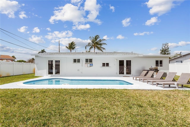 3710 NW 6th Ave, Deerfield Beach, FL 33064 - back of house with french doors, stucco siding, and a patio