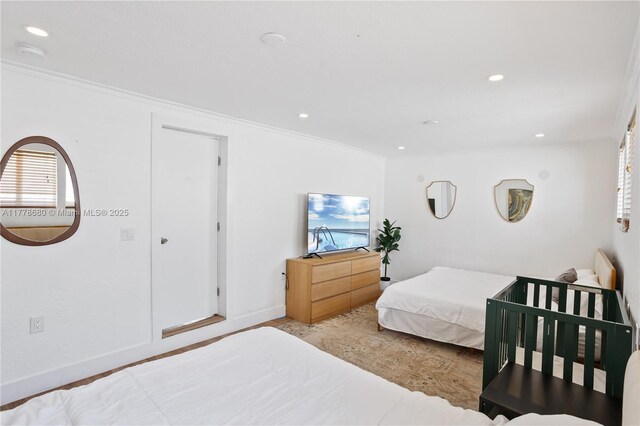 3710 NW 6th Ave, Deerfield Beach, FL 33064 - bedroom with crown molding, recessed lighting, and wood finished floors