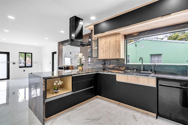 kitchen with dark cabinetry, dark stone counters, island range hood, and black appliances