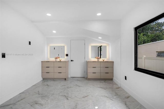 unfurnished bedroom featuring recessed lighting, marble finish floor, and baseboards