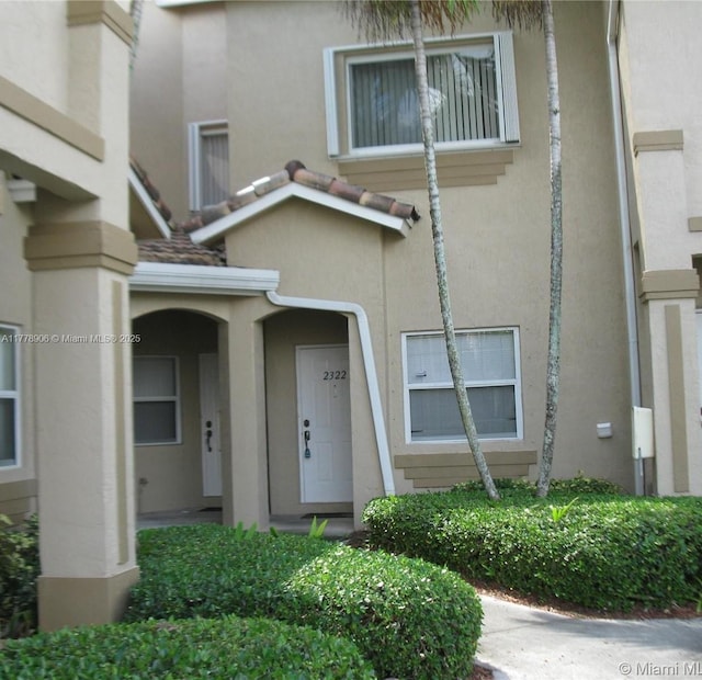 2322 SE 23rd Ave Unit 2322, Homestead, FL 33035 - doorway to property featuring stucco siding