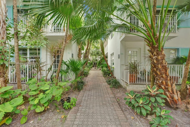 entrance to property featuring stucco siding