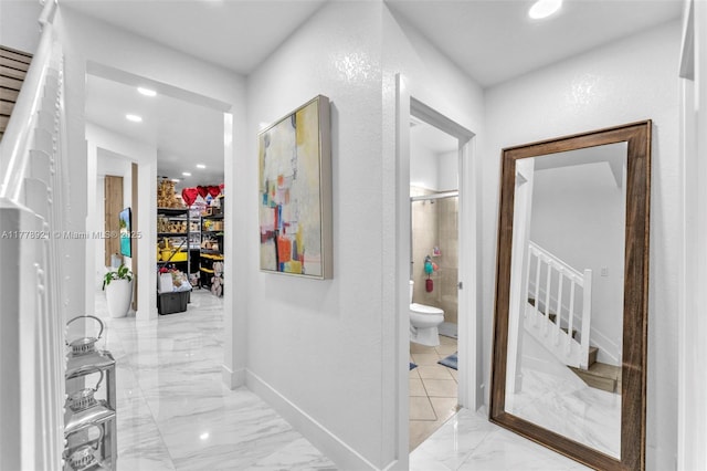 hallway with marble finish floor, baseboards, recessed lighting, and stairway