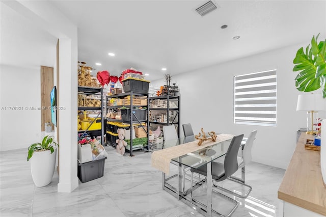 interior space with visible vents and recessed lighting