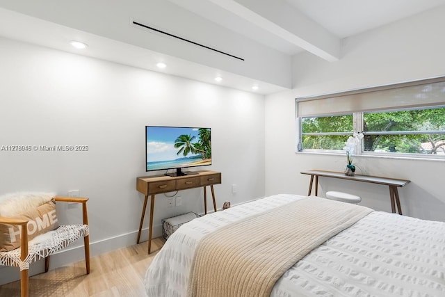 bedroom with light wood-type flooring, beamed ceiling, baseboards, and recessed lighting