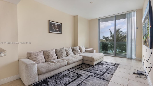 2681 N Flamingo Rd Unit 306S, Sunrise, FL 33323 - tiled living room with expansive windows and baseboards