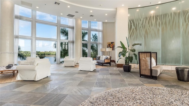2681 N Flamingo Rd Unit 306S, Sunrise, FL 33323 - community lobby featuring a towering ceiling and recessed lighting
