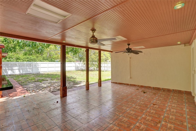 view of patio / terrace with fence and ceiling fan