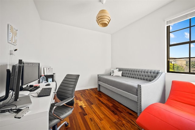 office featuring baseboards and wood finished floors