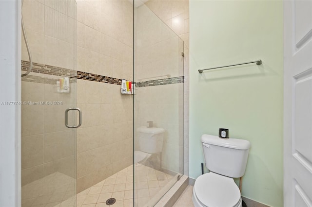 full bathroom with toilet and a stall shower