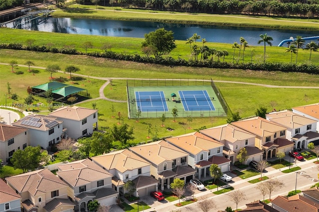 aerial view with a water view and a residential view