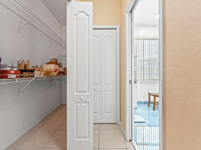 interior space featuring light tile patterned floors