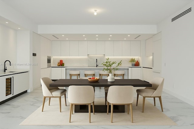 160 Isle Of Venice Dr Unit Ph2, Fort Lauderdale, FL 33301 - dining area featuring wine cooler, visible vents, recessed lighting, and marble finish floor