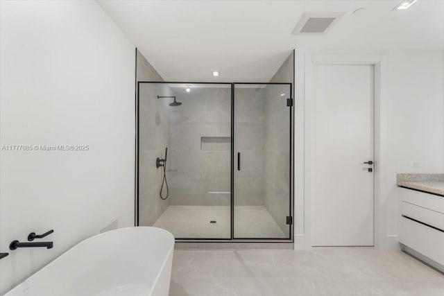 160 Isle Of Venice Dr Unit Ph2, Fort Lauderdale, FL 33301 - full bath with a freestanding tub, vanity, visible vents, and a stall shower