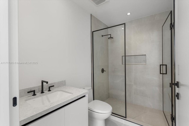 160 Isle Of Venice Dr Unit Ph2, Fort Lauderdale, FL 33301 - bathroom featuring a shower stall, vanity, and toilet