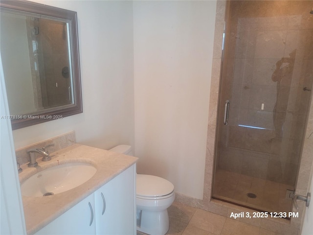 1331 Brickell Bay Dr Unit 2702, Miami, FL 33131 - full bath with a stall shower, toilet, vanity, and tile patterned flooring