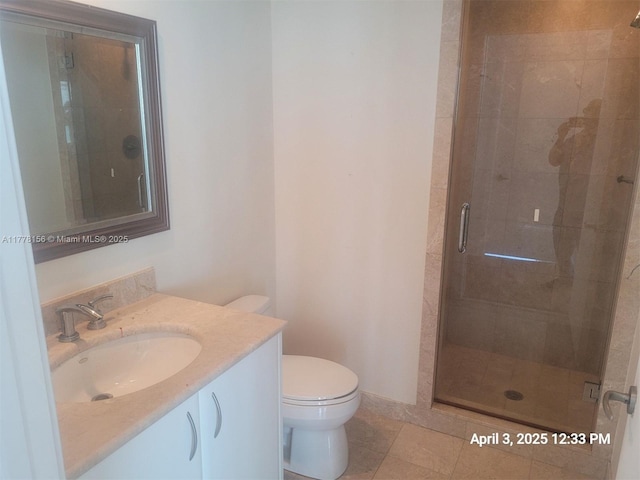 1331 Brickell Bay Dr Unit 2702, Miami, FL 33131 - bathroom featuring a shower stall, vanity, toilet, and tile patterned floors