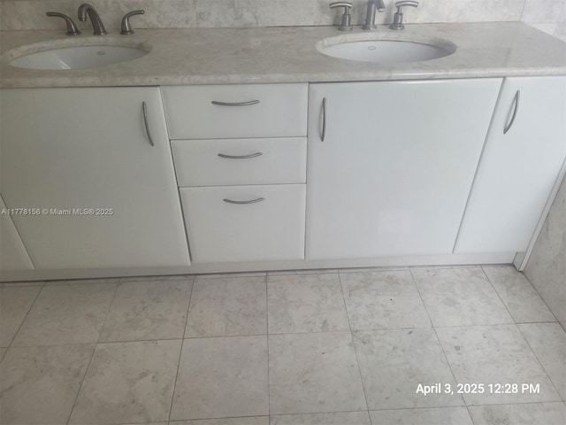 1331 Brickell Bay Dr Unit 2702, Miami, FL 33131 - bathroom with double vanity and tile patterned flooring