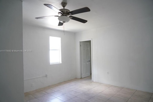 spare room featuring ceiling fan