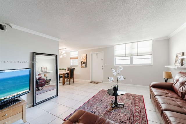 1811 Jefferson St Unit 304, Hollywood, FL 33020 - living room featuring a chandelier, light tile patterned flooring, ornamental molding, and a textured ceiling