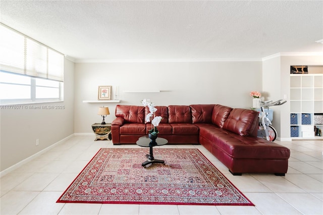 1811 Jefferson St Unit 304, Hollywood, FL 33020 - living room featuring crown molding, a textured ceiling, and tile patterned floors