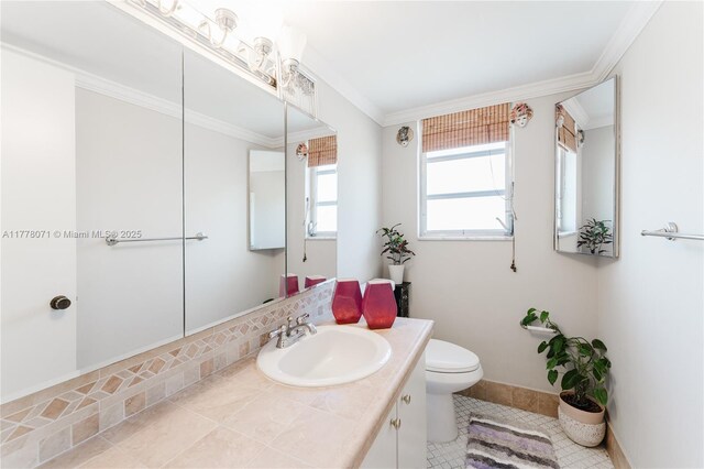 1811 Jefferson St Unit 304, Hollywood, FL 33020 - bathroom featuring vanity, ornamental molding, and tile patterned flooring