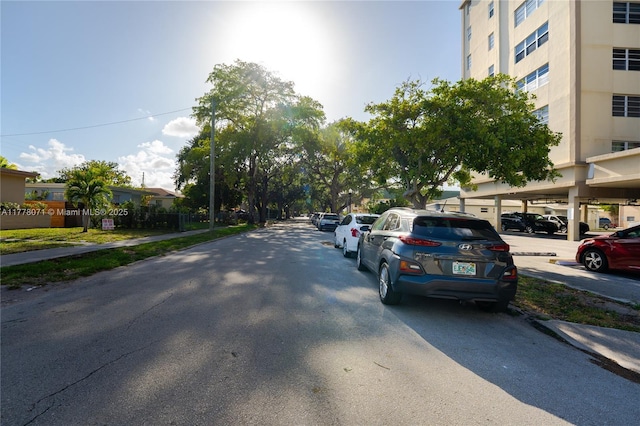 1811 Jefferson St Unit 304, Hollywood, FL 33020 - view of asphalt road featuring sidewalks and curbs