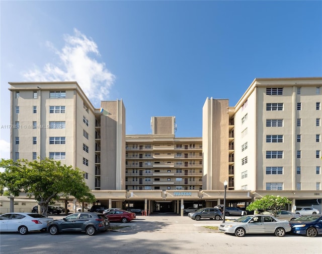 1811 Jefferson St Unit 304, Hollywood, FL 33020 - view of property with uncovered parking