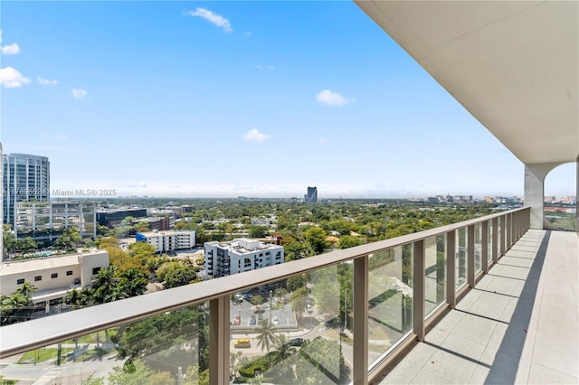 balcony featuring a city view