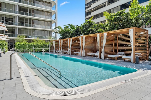 community pool with a patio