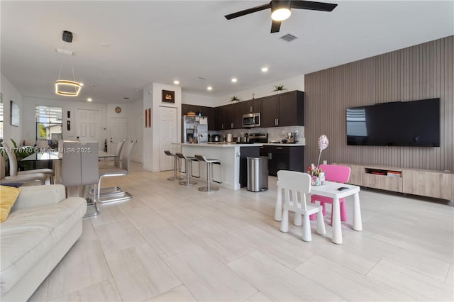 3431 W 109th Pl, Hialeah, FL 33018 - living area with a ceiling fan and recessed lighting