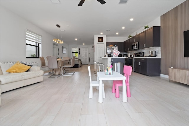 3431 W 109th Pl, Hialeah, FL 33018 - dining space with ceiling fan and recessed lighting