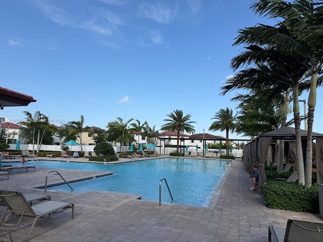 3431 W 109th Pl, Hialeah, FL 33018 - community pool with a patio area and a gazebo