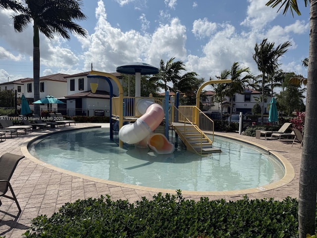 3431 W 109th Pl, Hialeah, FL 33018 - community pool featuring a patio area and a water slide