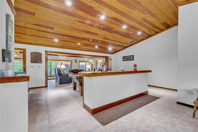 7801 SW 170th St, Palmetto Bay, FL 33157 - kitchen with light tile patterned floors, baseboards, lofted ceiling, and wood ceiling