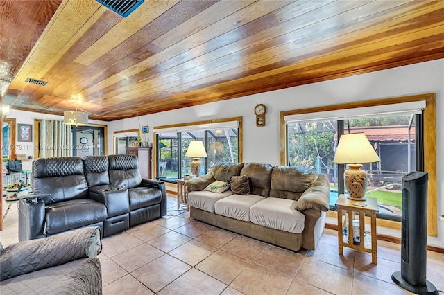 7801 SW 170th St, Palmetto Bay, FL 33157 - living room featuring light tile patterned floors, visible vents, and wooden ceiling