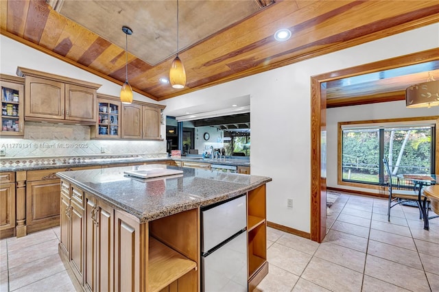 7801 SW 170th St, Palmetto Bay, FL 33157 - kitchen with light tile patterned floors, open shelves, a kitchen island, wooden ceiling, and backsplash