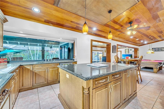 7801 SW 170th St, Palmetto Bay, FL 33157 - kitchen with wooden ceiling, dark stone countertops, a kitchen island, pendant lighting, and a sink
