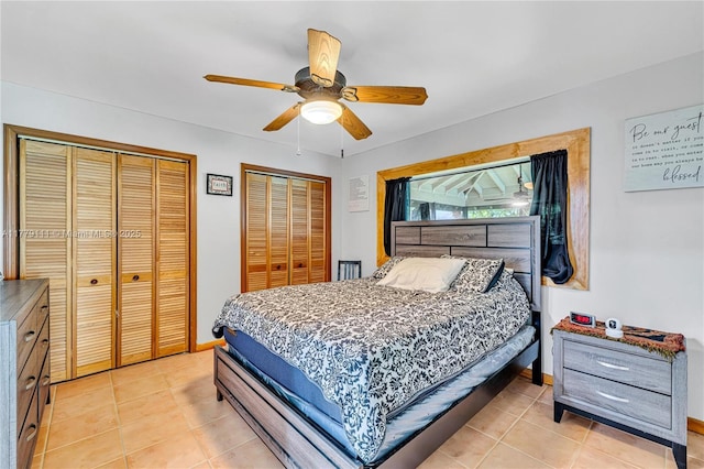7801 SW 170th St, Palmetto Bay, FL 33157 - bedroom featuring light tile patterned floors, baseboards, a ceiling fan, and multiple closets