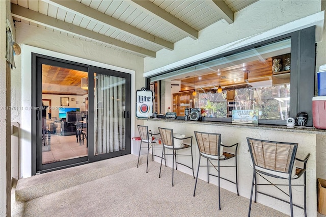 7801 SW 170th St, Palmetto Bay, FL 33157 - bar with beamed ceiling and carpet flooring