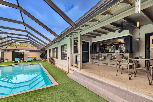 7801 SW 170th St, Palmetto Bay, FL 33157 - pool featuring a yard, ceiling fan, glass enclosure, and a patio