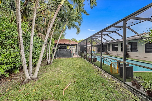 7801 SW 170th St, Palmetto Bay, FL 33157 - view of yard featuring a lanai, an outdoor pool, and fence