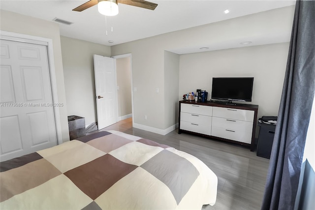bedroom featuring visible vents, baseboards, and a ceiling fan