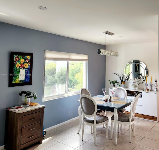 13255 SW 7th Ct Unit 401D, Pembroke Pines, FL 33027 - dining area with light tile patterned flooring and baseboards