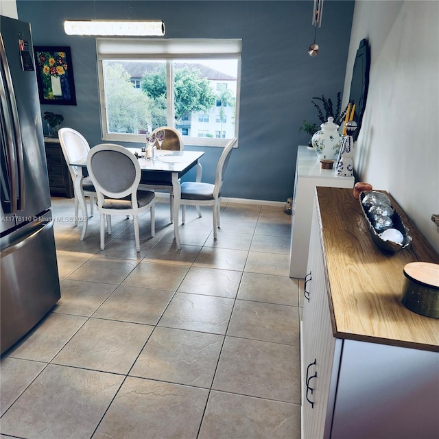 13255 SW 7th Ct Unit 401D, Pembroke Pines, FL 33027 - dining space with tile patterned floors and baseboards