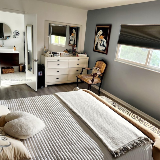 13255 SW 7th Ct Unit 401D, Pembroke Pines, FL 33027 - bedroom featuring dark wood-type flooring