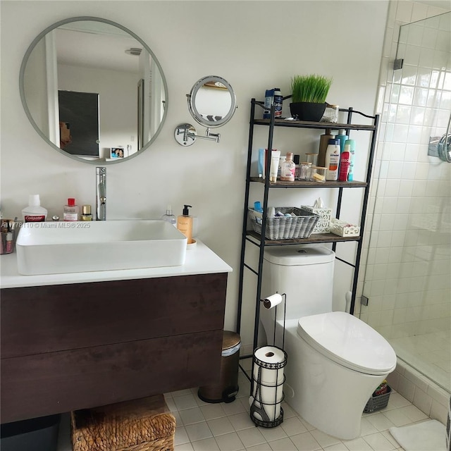 13255 SW 7th Ct Unit 401D, Pembroke Pines, FL 33027 - bathroom with a stall shower, vanity, tile patterned flooring, and toilet