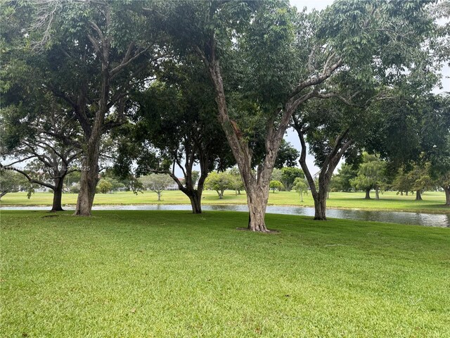 13255 SW 7th Ct Unit 401D, Pembroke Pines, FL 33027 - view of green lawn
