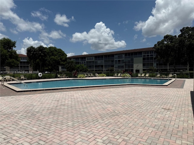 13255 SW 7th Ct Unit 401D, Pembroke Pines, FL 33027 - community pool with a patio area