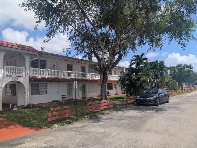 175 NE 203rd Ter Unit 24, Miami Gardens, FL 33179 - view of front of property featuring stucco siding